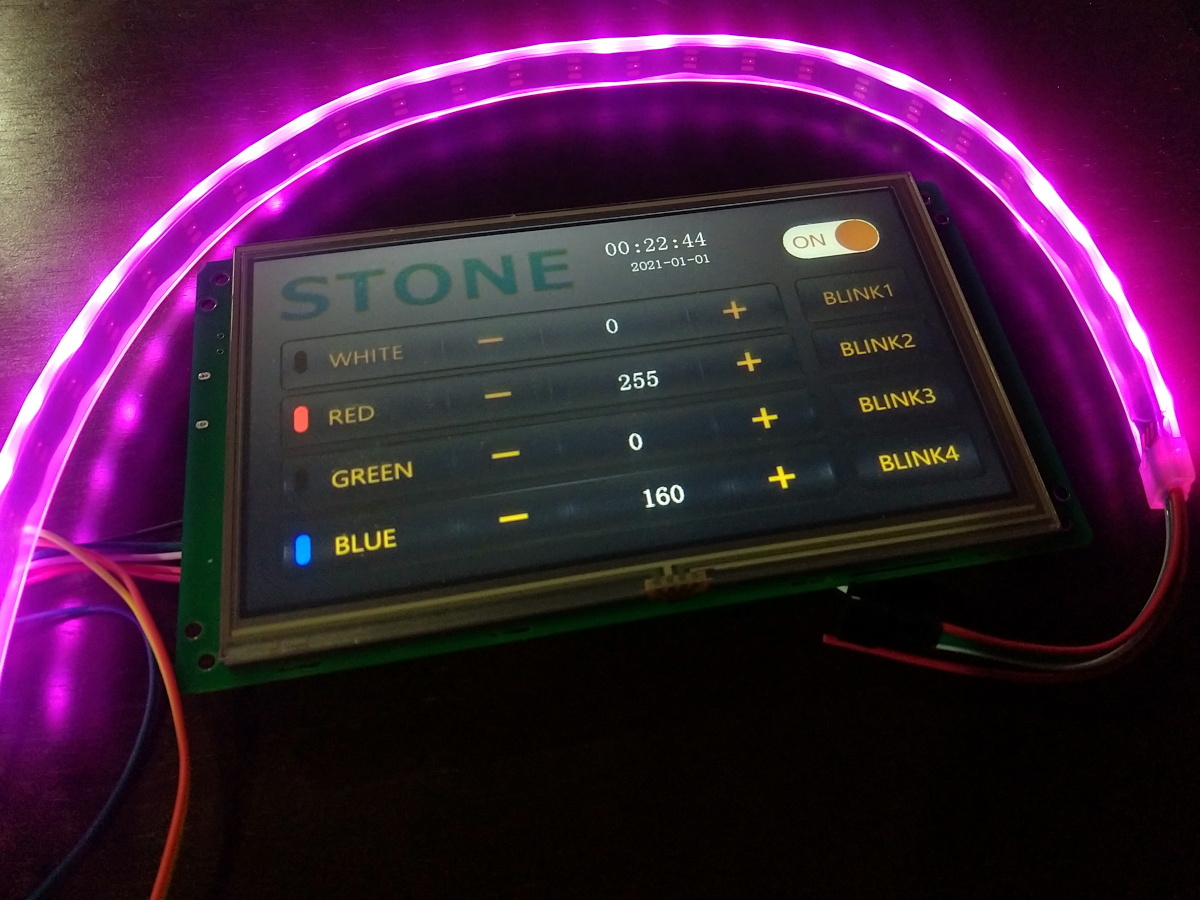 LCD Display connected to a RGB strip, showing a User Interface with buttons to change the colors.